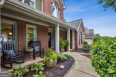 Charming 3-Bedroom Home in Sought-After Towne Lake Hills West - on Towne Lake Hills Golf Club in Georgia - for sale on GolfHomes.com, golf home, golf lot