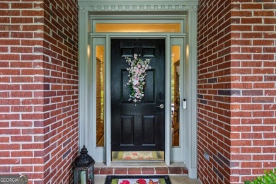 Charming 3-Bedroom Home in Sought-After Towne Lake Hills West - on Towne Lake Hills Golf Club in Georgia - for sale on GolfHomes.com, golf home, golf lot