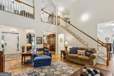 Charming 3-Bedroom Home in Sought-After Towne Lake Hills West - on Towne Lake Hills Golf Club in Georgia - for sale on GolfHomes.com, golf home, golf lot