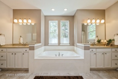 An INVITING front porch and PEACEFUL water feature greets you at on Whisper Creek Golf Club in Illinois - for sale on GolfHomes.com, golf home, golf lot