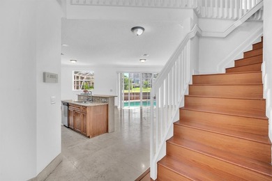 Elegant two-story residence located in the highly sought-after on Palm-Aire Country Club and Resort - The Oaks in Florida - for sale on GolfHomes.com, golf home, golf lot