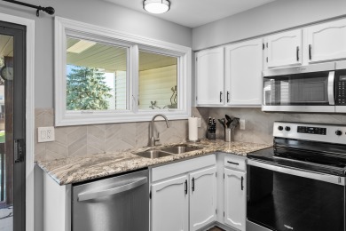 Lovely Lakes of Woodbridge condo. Two bedroom, two full bath in on The Moors Golf Club in Michigan - for sale on GolfHomes.com, golf home, golf lot
