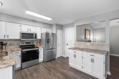 Lovely Lakes of Woodbridge condo. Two bedroom, two full bath in on The Moors Golf Club in Michigan - for sale on GolfHomes.com, golf home, golf lot