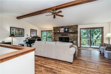Located in a friendly, social neighborhood near the golf course on Holiday Island Golf Course in Arkansas - for sale on GolfHomes.com, golf home, golf lot