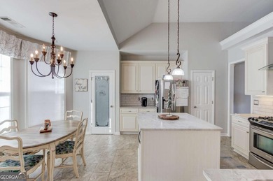 Welcome home to this inviting 4-bedroom, 2.5-bath beauty located on Hamilton Mill Golf Club in Georgia - for sale on GolfHomes.com, golf home, golf lot