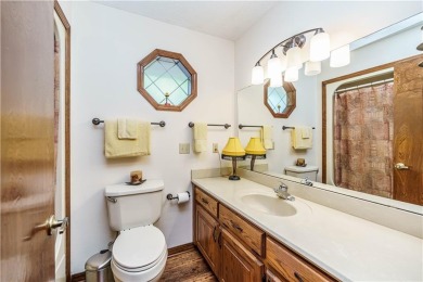 Located in a friendly, social neighborhood near the golf course on Holiday Island Golf Course in Arkansas - for sale on GolfHomes.com, golf home, golf lot