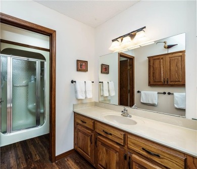 Located in a friendly, social neighborhood near the golf course on Holiday Island Golf Course in Arkansas - for sale on GolfHomes.com, golf home, golf lot