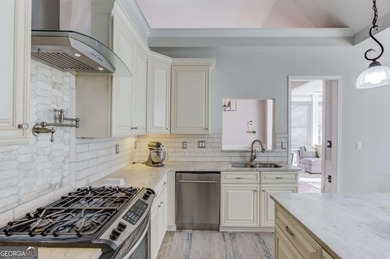 Welcome home to this inviting 4-bedroom, 2.5-bath beauty located on Hamilton Mill Golf Club in Georgia - for sale on GolfHomes.com, golf home, golf lot