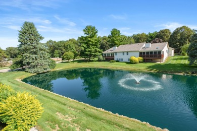 Lovely Lakes of Woodbridge condo. Two bedroom, two full bath in on The Moors Golf Club in Michigan - for sale on GolfHomes.com, golf home, golf lot