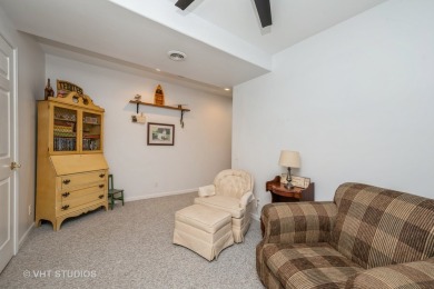 An INVITING front porch and PEACEFUL water feature greets you at on Whisper Creek Golf Club in Illinois - for sale on GolfHomes.com, golf home, golf lot