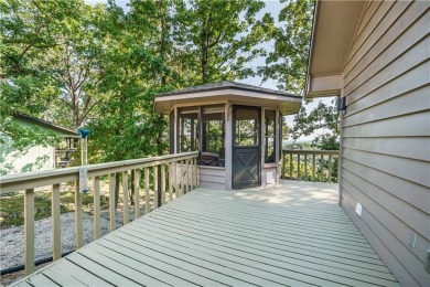 Located in a friendly, social neighborhood near the golf course on Holiday Island Golf Course in Arkansas - for sale on GolfHomes.com, golf home, golf lot