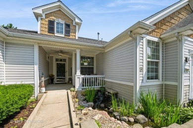 An INVITING front porch and PEACEFUL water feature greets you at on Whisper Creek Golf Club in Illinois - for sale on GolfHomes.com, golf home, golf lot