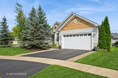 An INVITING front porch and PEACEFUL water feature greets you at on Whisper Creek Golf Club in Illinois - for sale on GolfHomes.com, golf home, golf lot