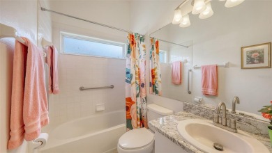This bright and beautiful 3 bedroom, 2 1/2 bath home is on Stoneybrook Golf and Country Club of Sarasota in Florida - for sale on GolfHomes.com, golf home, golf lot