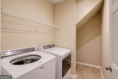 Welcome home to this inviting 4-bedroom, 2.5-bath beauty located on Hamilton Mill Golf Club in Georgia - for sale on GolfHomes.com, golf home, golf lot