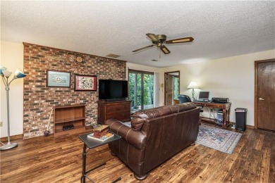 Located in a friendly, social neighborhood near the golf course on Holiday Island Golf Course in Arkansas - for sale on GolfHomes.com, golf home, golf lot