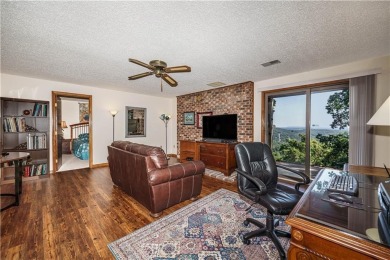 Located in a friendly, social neighborhood near the golf course on Holiday Island Golf Course in Arkansas - for sale on GolfHomes.com, golf home, golf lot