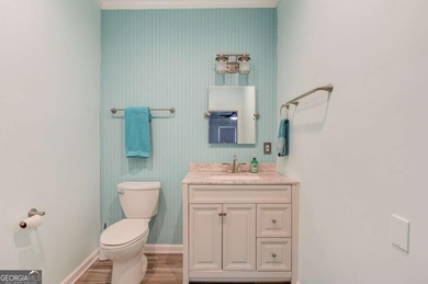 Welcome home to this inviting 4-bedroom, 2.5-bath beauty located on Hamilton Mill Golf Club in Georgia - for sale on GolfHomes.com, golf home, golf lot