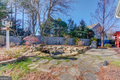 Welcome home to this inviting 4-bedroom, 2.5-bath beauty located on Hamilton Mill Golf Club in Georgia - for sale on GolfHomes.com, golf home, golf lot