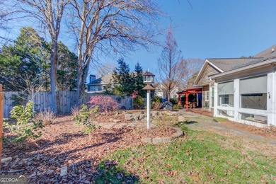 Welcome home to this inviting 4-bedroom, 2.5-bath beauty located on Hamilton Mill Golf Club in Georgia - for sale on GolfHomes.com, golf home, golf lot