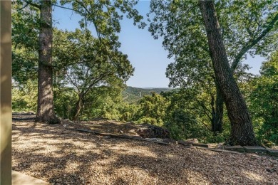 Located in a friendly, social neighborhood near the golf course on Holiday Island Golf Course in Arkansas - for sale on GolfHomes.com, golf home, golf lot
