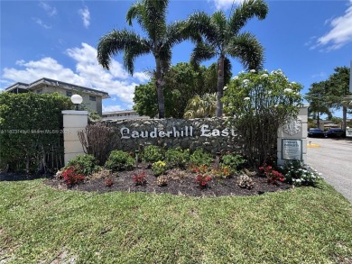 Are you looking for a condo well priced, not far from the beach on Lauderhill Golf Course in Florida - for sale on GolfHomes.com, golf home, golf lot