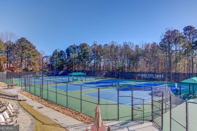 Welcome home to this inviting 4-bedroom, 2.5-bath beauty located on Hamilton Mill Golf Club in Georgia - for sale on GolfHomes.com, golf home, golf lot