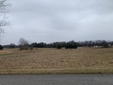 A beautiful building site overlooking the 7th hole and pond of on Eagle Glen Golf Course in Michigan - for sale on GolfHomes.com, golf home, golf lot