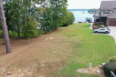 Build your dream lake home on this beautiful  +/- acre cleared on The Patriot Golf Club At Grand Harbor in South Carolina - for sale on GolfHomes.com, golf home, golf lot