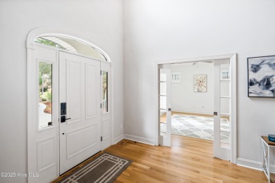 Nestled on a quiet tree-lined street, this custom-built home on Members Club At St. James Plantation in North Carolina - for sale on GolfHomes.com, golf home, golf lot