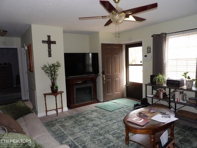 Well-maintained property featuring a 14' RV carport with hookups on Lake Tansi Village Country Club in Tennessee - for sale on GolfHomes.com, golf home, golf lot