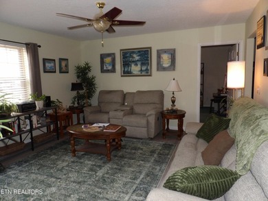 Well-maintained property featuring a 14' RV carport with hookups on Lake Tansi Village Country Club in Tennessee - for sale on GolfHomes.com, golf home, golf lot