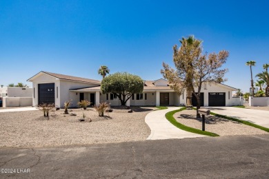 Welcome to 2341 Green Place, an exquisitely remodeled four on London Bridge Golf Course in Arizona - for sale on GolfHomes.com, golf home, golf lot