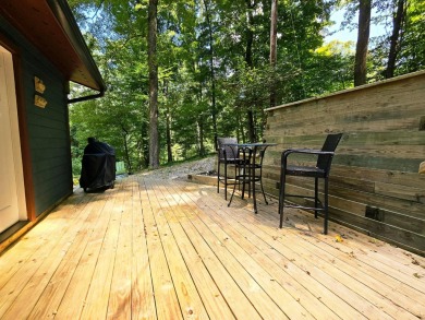 Beautifully updated 3 bed/3 bath cabin in Hide-A-Way Hills on Hide-A-Way Hills Golf Club in Ohio - for sale on GolfHomes.com, golf home, golf lot