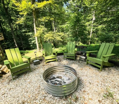 Beautifully updated 3 bed/3 bath cabin in Hide-A-Way Hills on Hide-A-Way Hills Golf Club in Ohio - for sale on GolfHomes.com, golf home, golf lot