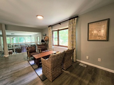 Beautifully updated 3 bed/3 bath cabin in Hide-A-Way Hills on Hide-A-Way Hills Golf Club in Ohio - for sale on GolfHomes.com, golf home, golf lot
