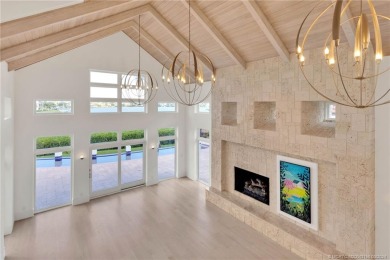 At the intersection of architecture, nature, and water lies this on Sailfish Point Golf Club, Inc. in Florida - for sale on GolfHomes.com, golf home, golf lot