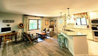 Beautifully updated 3 bed/3 bath cabin in Hide-A-Way Hills on Hide-A-Way Hills Golf Club in Ohio - for sale on GolfHomes.com, golf home, golf lot