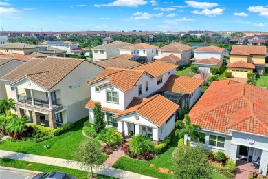 Welcome to this exquisite 4-bedroom home in the heart of Lake on Eagle Creek Golf Club in Florida - for sale on GolfHomes.com, golf home, golf lot