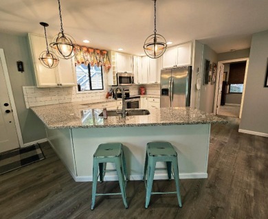 Beautifully updated 3 bed/3 bath cabin in Hide-A-Way Hills on Hide-A-Way Hills Golf Club in Ohio - for sale on GolfHomes.com, golf home, golf lot