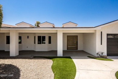 Welcome to 2341 Green Place, an exquisitely remodeled four on London Bridge Golf Course in Arizona - for sale on GolfHomes.com, golf home, golf lot