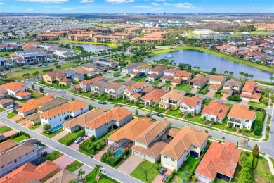 Welcome to this exquisite 4-bedroom home in the heart of Lake on Eagle Creek Golf Club in Florida - for sale on GolfHomes.com, golf home, golf lot