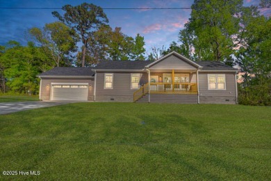 Why settle for ordinary when you can own this 2025 custom-built on Minnesott Golf and Country Club in North Carolina - for sale on GolfHomes.com, golf home, golf lot