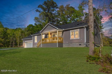 Why settle for ordinary when you can own this 2025 custom-built on Minnesott Golf and Country Club in North Carolina - for sale on GolfHomes.com, golf home, golf lot