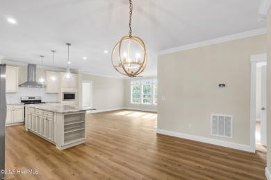 Why settle for ordinary when you can own this 2025 custom-built on Minnesott Golf and Country Club in North Carolina - for sale on GolfHomes.com, golf home, golf lot