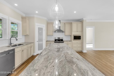 Why settle for ordinary when you can own this 2025 custom-built on Minnesott Golf and Country Club in North Carolina - for sale on GolfHomes.com, golf home, golf lot