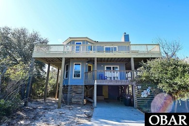 Sitting well elevated in an X flood zone, Sunny Days is located on The Currituck Golf Club in North Carolina - for sale on GolfHomes.com, golf home, golf lot