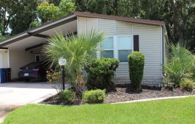 This spacious residence of 2 bedroom features oasis landscaping on Schalamar Creek Golf and Country Club in Florida - for sale on GolfHomes.com, golf home, golf lot