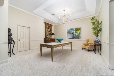 Truly remarkable home designed by Gary Kelly sits on almost 1/2 on Heritage Ridge Golf Club in Florida - for sale on GolfHomes.com, golf home, golf lot