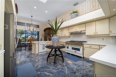 Truly remarkable home designed by Gary Kelly sits on almost 1/2 on Heritage Ridge Golf Club in Florida - for sale on GolfHomes.com, golf home, golf lot